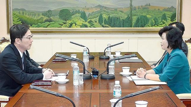 Los delegados en la sala de reuniones