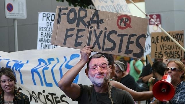 Independentistas abuchean a Rajoy y Albiol