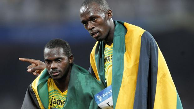 Bolt y Nesta Carter
