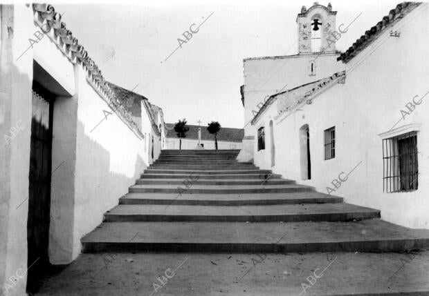 Una Típica calle del pueblo Coria del Río (Sevilla), al fondo se Aprecia un...