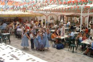 Ambiente familiar en las casetas de la Real Feria de Málaga