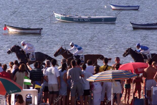 Carreras de caballos en la playa, al caer la tarde ARCHSEV