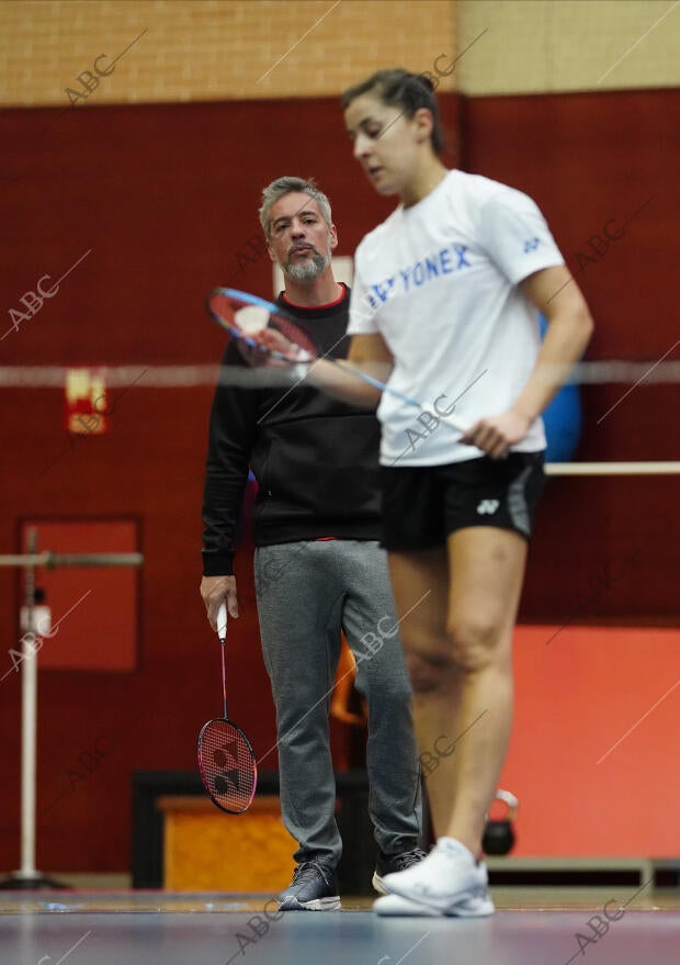Fernando Rivas, junto a su pupila Carolina Marín