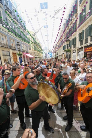 Comienzo de la Feria. Centro calle Larios